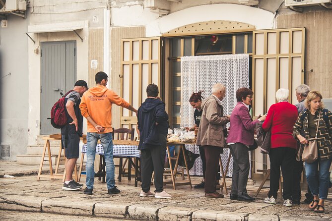 Bari Walking Tour with Pasta Experience - Piazza Mercantile and the social center of Bari Vecchia