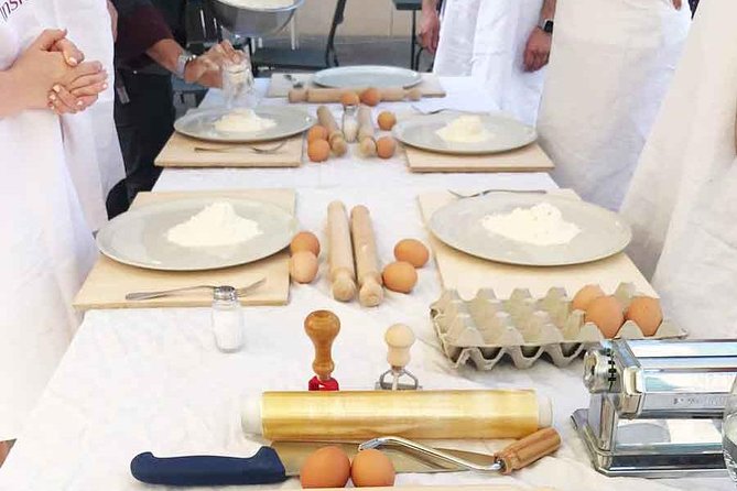 Become a Masterchef in Rome: Pasta, Ravioli and Tiramisù Class - Sitting down to eat what you made