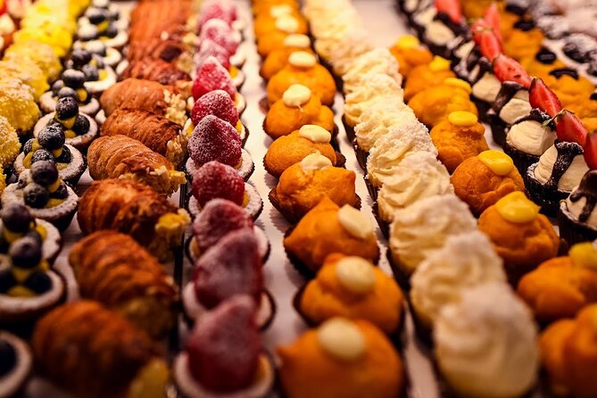 Bologna Food & Market Tour with 6 Tastings, Pasta, Wines & More - Parmigiano and balsamic show how time changes flavor