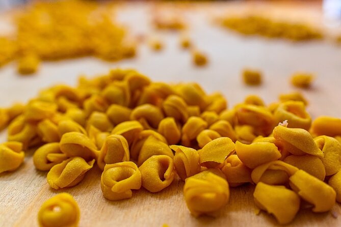 Bologna Food & Market Tour with 6 Tastings, Pasta, Wines & More - Cured meats, wine, and the secret dish keep the menu moving