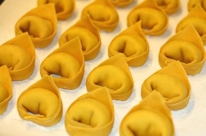 Cesarine: Pasta & Tiramisu Class at a Local's Home in Bologna - From work table to shared meal