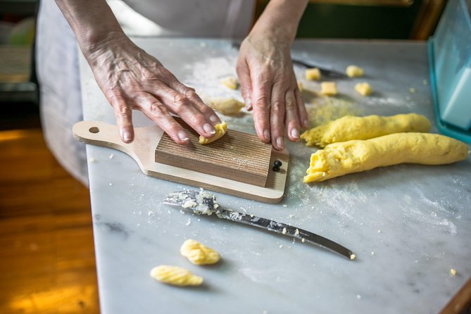 Cesarine: Pasta & Tiramisu Class at Local's Home in Milan - Making pasta in a Milanese home