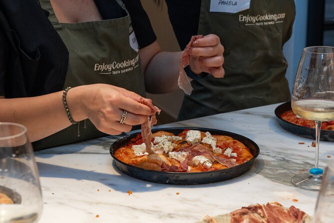 Cook & Dine in Rome: Pizza, Ravioli & Gelato with Unlimited Wine - Rolling dough and shaping ravioli