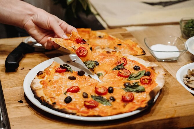 Devour Rome Wine & Pizza Making Class in Trastevere Neighborhood - Trastevere gives the class a useful Rome setting