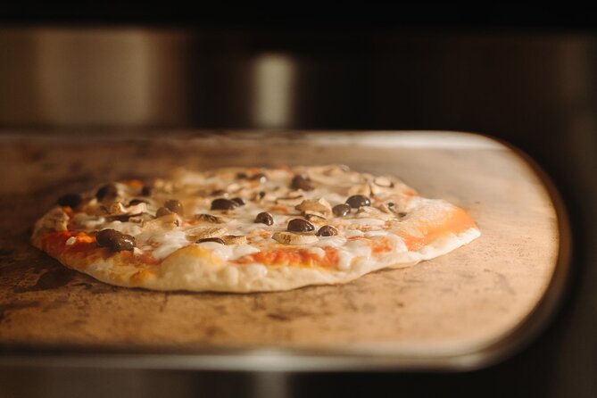 Devour Rome Wine & Pizza Making Class in Trastevere Neighborhood - Who will enjoy this evening most?
