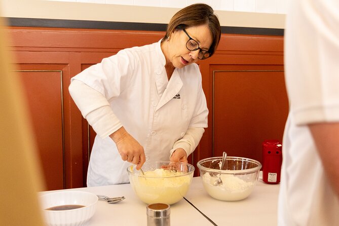 Fettuccine, Ravioli and Tiramisu Pasta Making in Rome - Mixing flour and eggs for homemade pasta