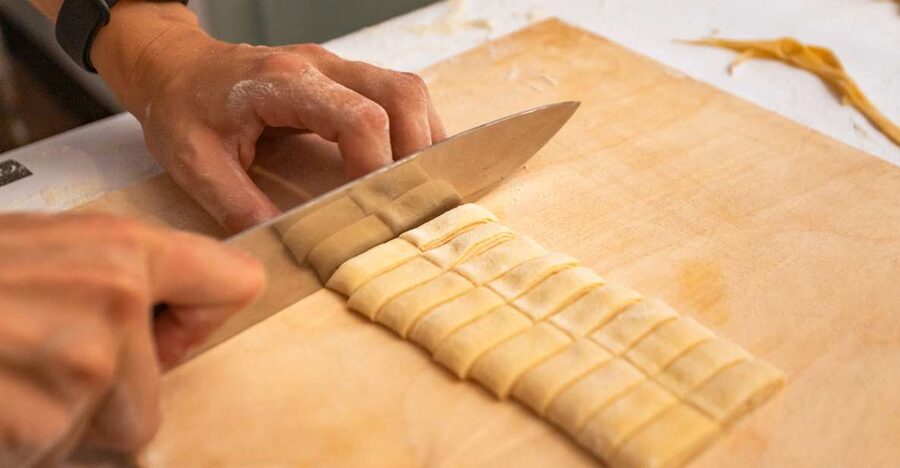 Fettuccine & Tiramisù: Cooking Class with Wine & Limoncello - Eating Your Work at Gusto Restaurant