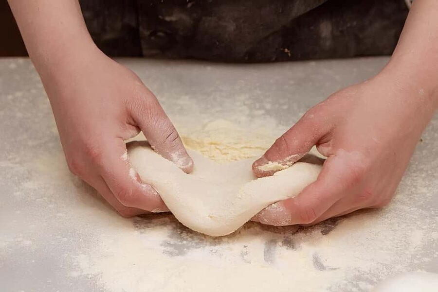 Florence: Private Pizza Making Class with Wine Tasting - Mixing and shaping the dough by hand