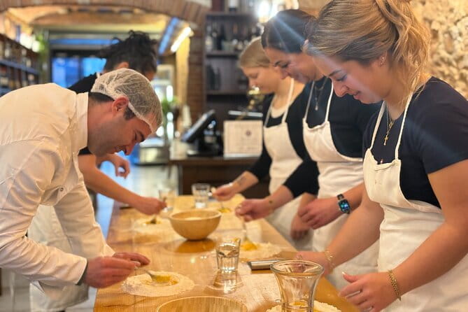 Florence: Tiramisu & Pasta Cooking Class with Unlimited Wine - Wine, dinner, and the value of $51.61