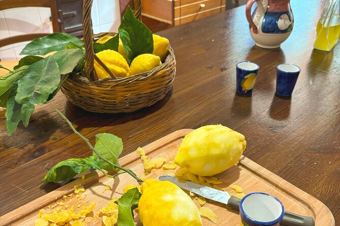 Fresh pasta and Limoncello course in a lemon grove - Preparing a three-course Sorrento meal