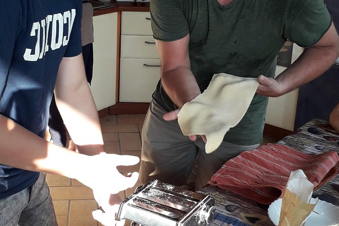 Handmade pasta workshop by Cilento Experience - Filling ricotta ravioli with local ingredients