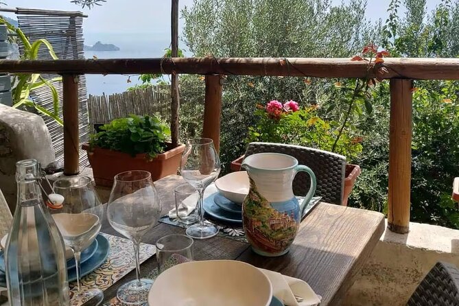 Hands-On Pasta and Tiramisu Class in Positano with Local Family - Sitting down for a family-style meal