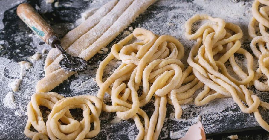 La Spezia: Pasta and Tiramisu Class at a Local's Home - Cooking pasta in a La Spezia home