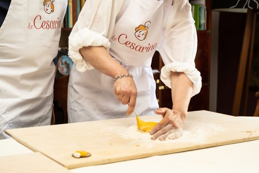 Lucca: Pasta and Tiramisu Class at a Local's Home - Sitting down to eat what you made