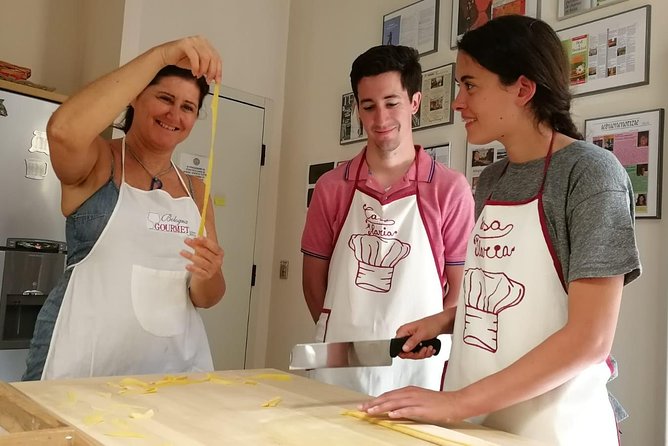Make traditional handmade pasta from scratch with a local chef! - Rolling pasta the old-fashioned way in Bologna