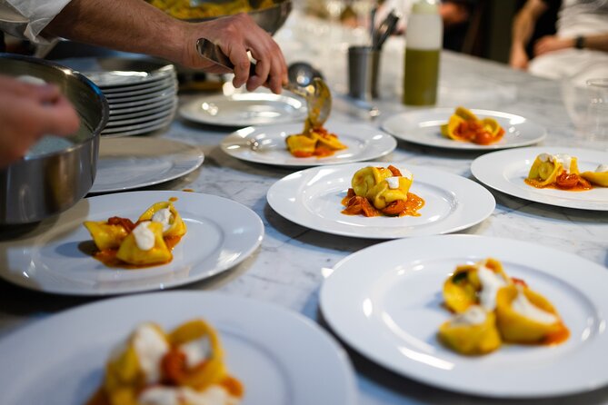 Milan Culinary Experience: Pasta & Gelato or Tiramisù Class - Making pasta above Milano Centrale