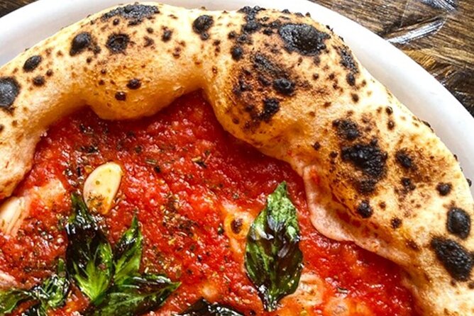 Naples Pizza Class: Learn, Bake & Eat the Authentic Pizza Taste - Eating your pizza with a drink and a secret dish