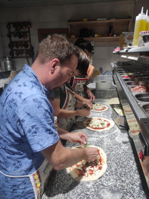 Naples: Small Group Pizza Making with Drink Included - Entering a traditional family-run pizzeria