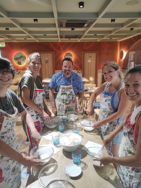 Naples: Small Group Pizza Making with Drink Included - Eating your pizza with a drink
