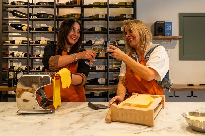 Pasta and Tiramisu Making Class with Fine Italian Wine in Rome - Building tiramisu one layer at a time