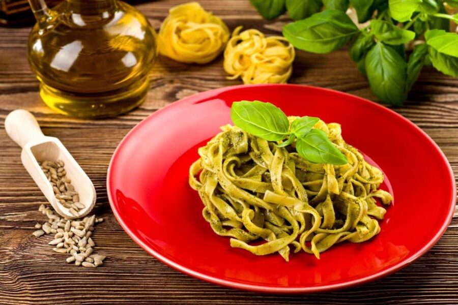 Pasta Cooking Class with Pesto Sauce Making in Rome Center - Rolling and cutting fresh fettuccine