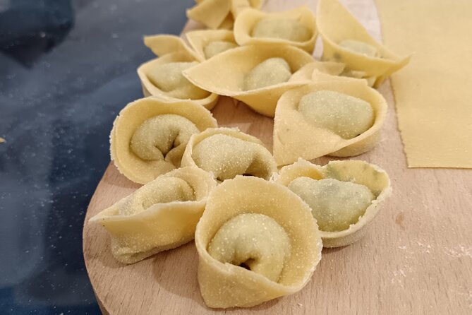 Pasta Making Class with Dinner and Wine in Florence - Eating the pasta you prepared