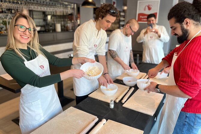 Pasta&Tiramisu Workshop: Craft Your Dinner with Free Flowing Wine - Rolling and cutting fresh fettuccine