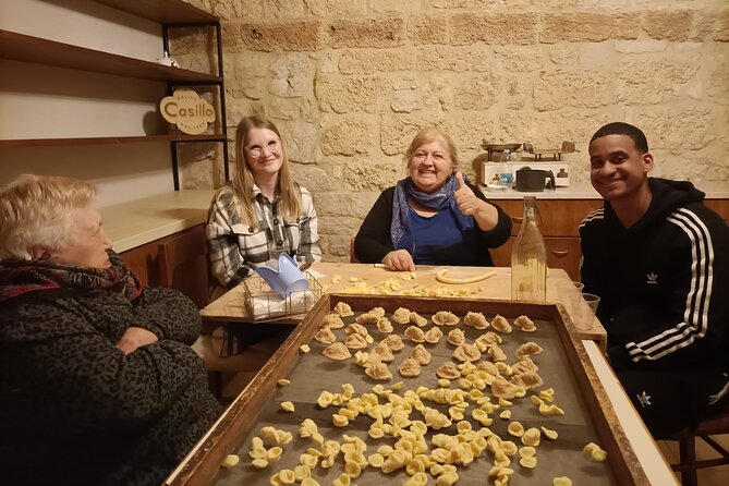 People of Bari unusual guided tour with pasta making at Grandma house - The dock, the fishermen, and everyday Bari