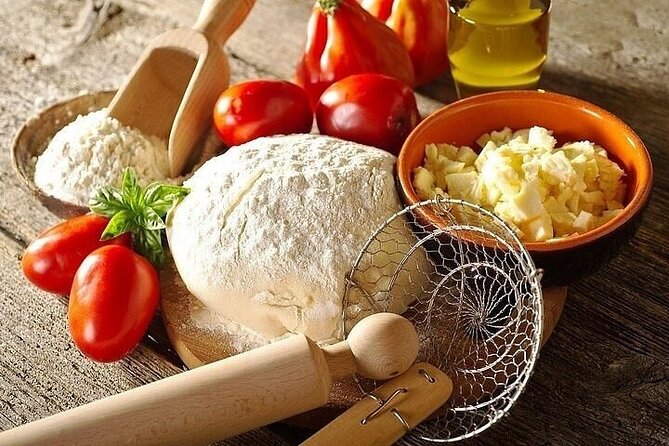 Pizza and Gelato Cooking Class in Milan Small Group Only - Sitting down for pizza, gelato, wine, and olive oil
