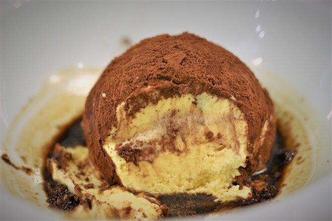 Pizza and Gelato Making Class in Rome - Cooking pizza in central Rome