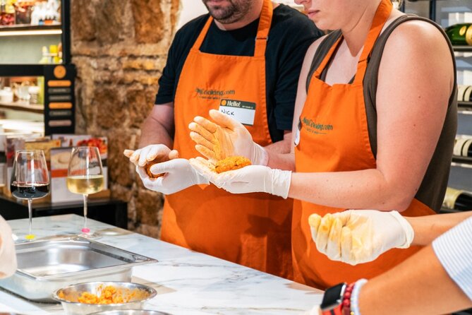 Pizza and Gelato Making Experience with Fine Italian Wine in Rome - Shaping pizza dough from scratch