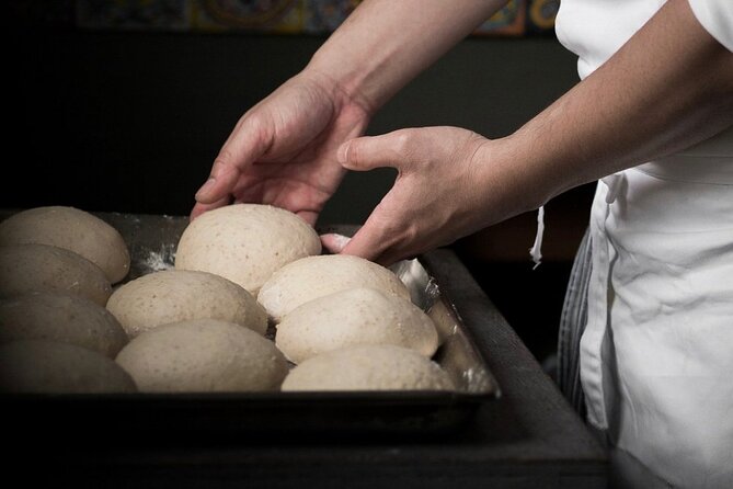 Pizza Making Private Class with Wine Tasting - Sauce, toppings, and the work before the oven