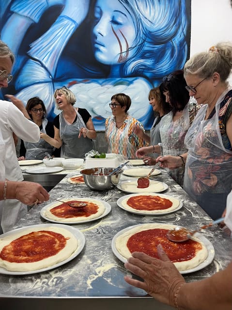 Pizza-Making Workshop by night with glass of wine - Sauce, mozzarella, and the final shape