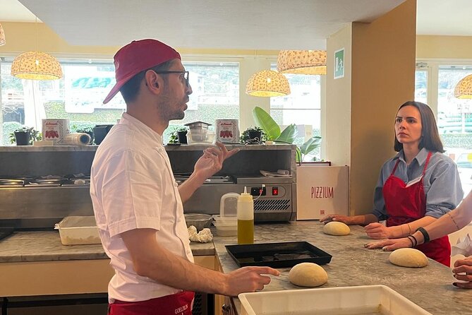 Premium Pizza Making Class at a Pizzeria in Como - Into the wood-fired oven