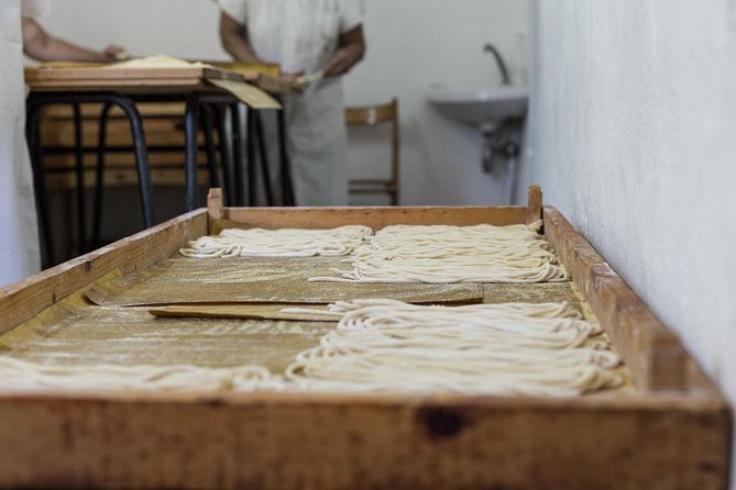 Private pasta-making class at a local's home with tasting in Lecce - Sitting down to eat what you made