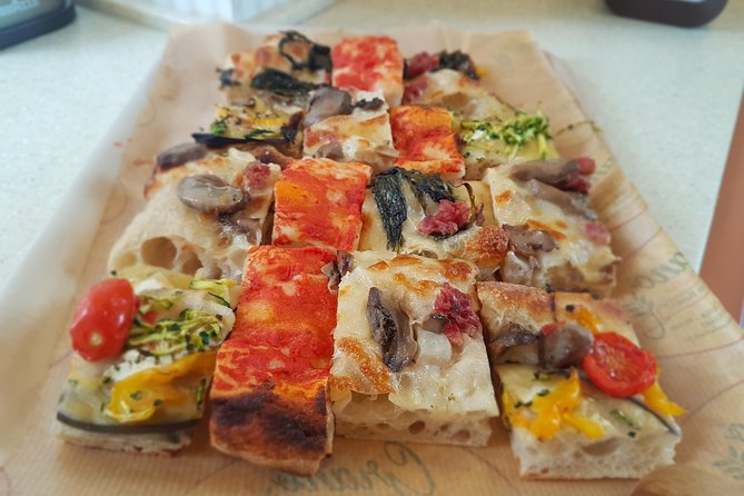 Private Pizza and Gelato Walking Tour in Rome - Trastevere begins with pizza by the slice