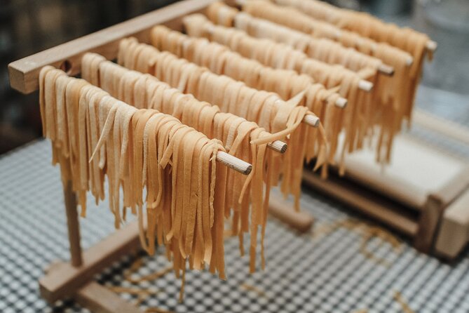 Rome Cooking Class: Make Pasta, Dine & Drink Wine With Local Chef - Eating what you made, with two sauces