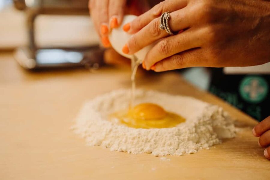 Rome: Fresh Pasta-Making Class with Wine and Gelato - Sitting down to eat your own work