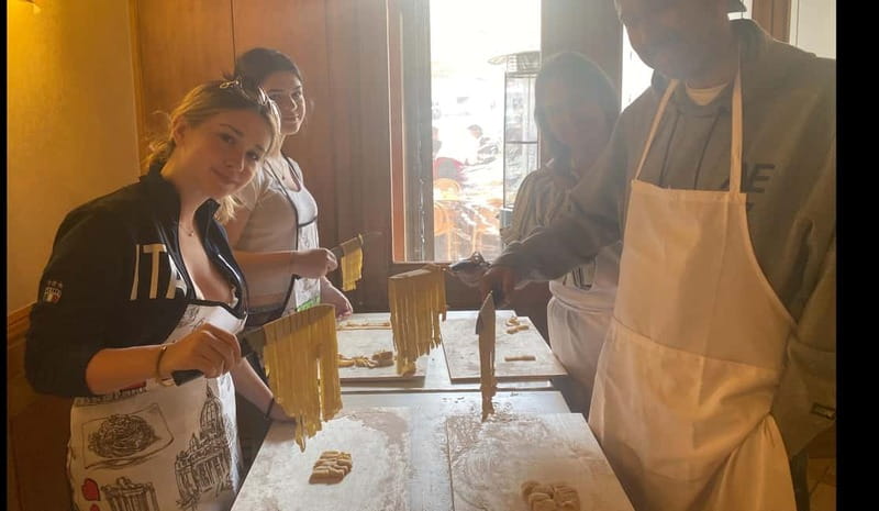 Rome: Hands-On Pasta & Tiramisu Class - Making pasta by hand at Jambo Bistrot