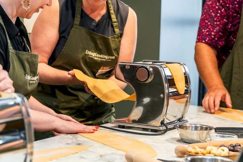 Rome: Hands-On Pasta & Tiramisu Class with Unlimited Wine - Shaping ravioli and learning the filling