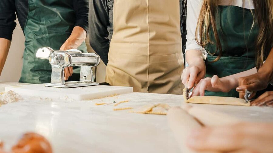 Rome: Pasta and Tiramisu Cooking Class with Prosecco - Turning flour into fresh fettuccine