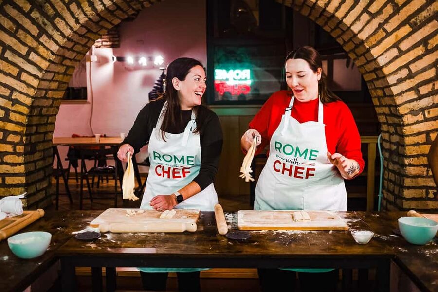 Rome: Pasta Class with 3 Spritz or Tiramisu by the Colosseum - Making fettuccine by hand