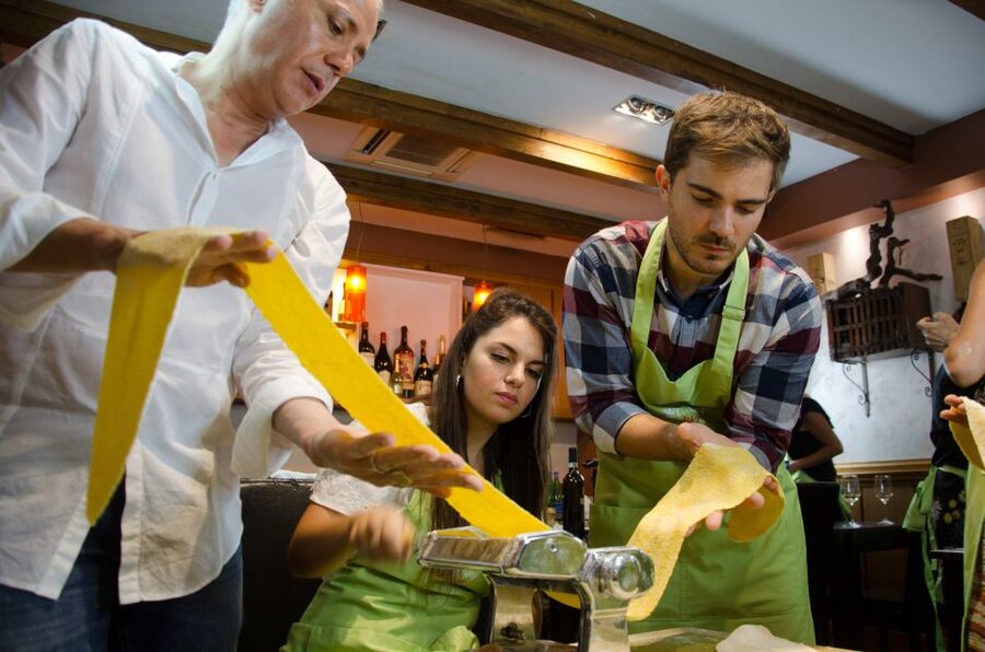 Rome: Pasta & Tiramisu Making Class - Making pasta near Navona Square