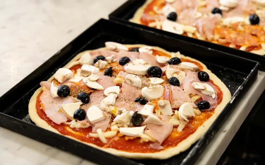 Rome: Pizza & Gelato Making Class with Wine & Limoncello - Mixing and shaping your own pizza dough
