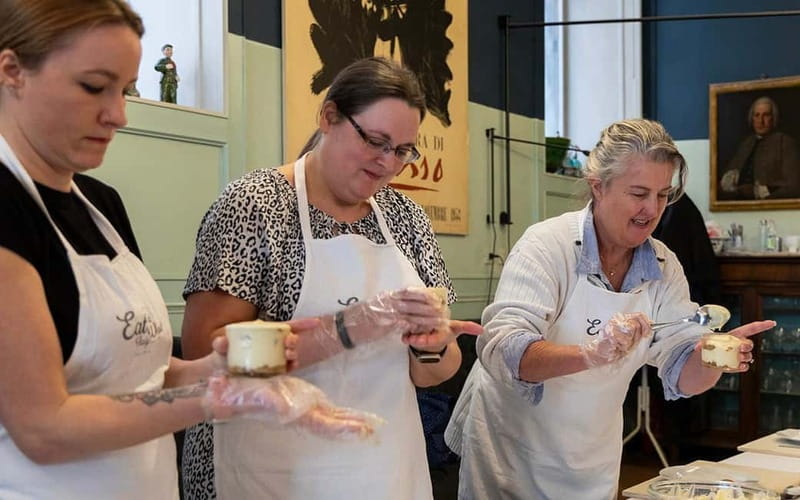 Rome: Pizza & Gelato Making Class with Wine & Limoncello - Sitting down to eat what you made