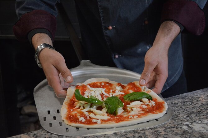 Rome: Pizza Making Class Small Group Experience - Shaping the dough at your own station