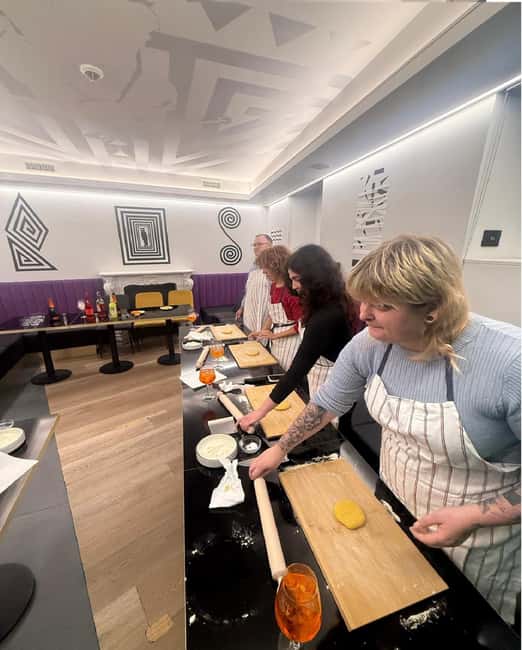 Rome: “Rooftop Pasta and Cocktails Cooking Class” - A rooftop setting with music and city views