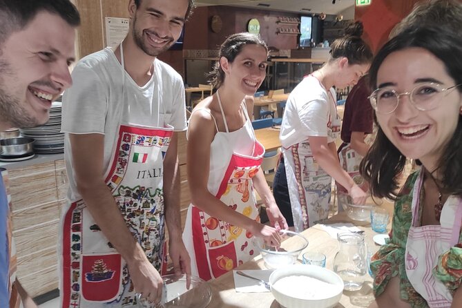 Semi-Private Pizza Making Experience in Naples with Drink - Shaping the dough is harder than it looks