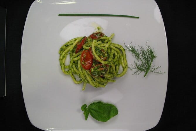 Small group PURO Vegan pasta and bruschette Class in Florence - Eating the pasta you made