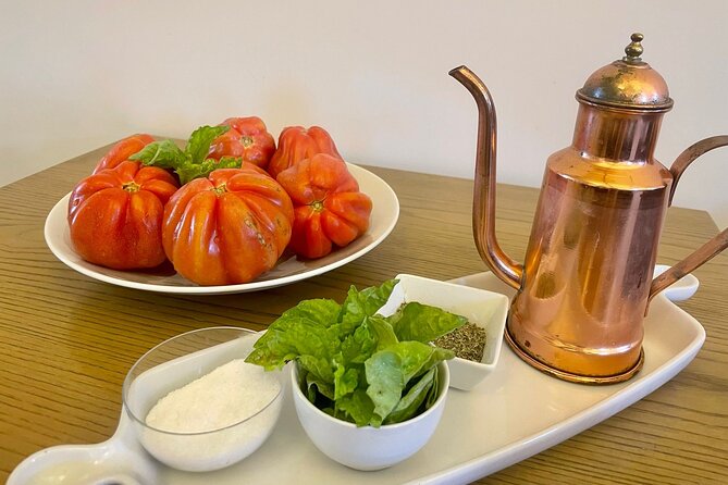 Sorrento: Hands-On Pasta, Tiramisu & Limoncello Fun Class - The garden, bruschetta, and first drink